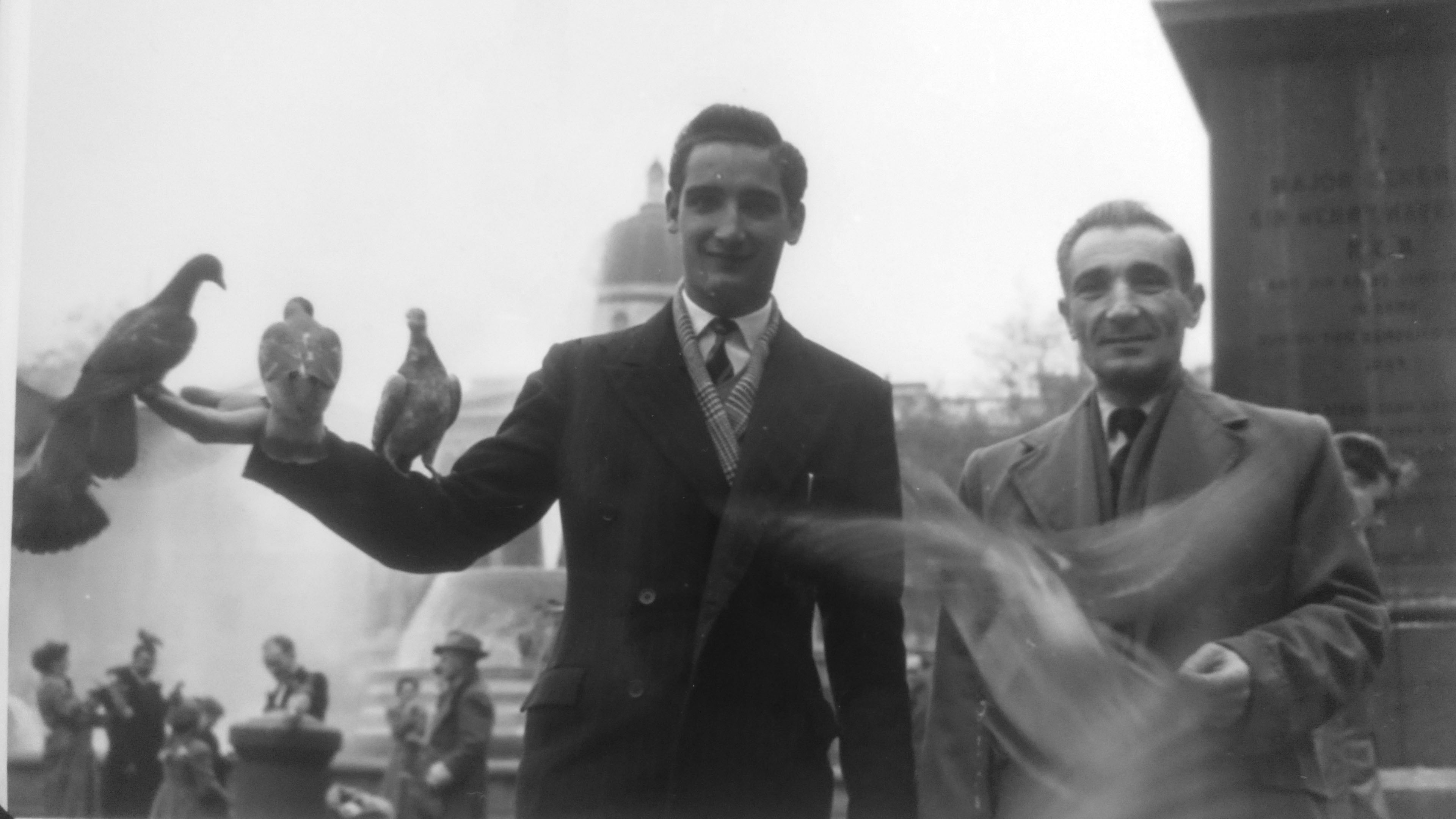 Michael is joined in London’s Trafalgar Square by his son Frank, freshly arrived to start a new life in Britain. Frank died in 2016, aged 80.